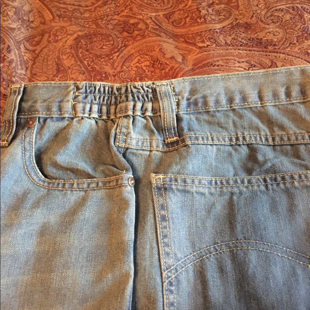 Three pairs of men’s jeans.new never worn
